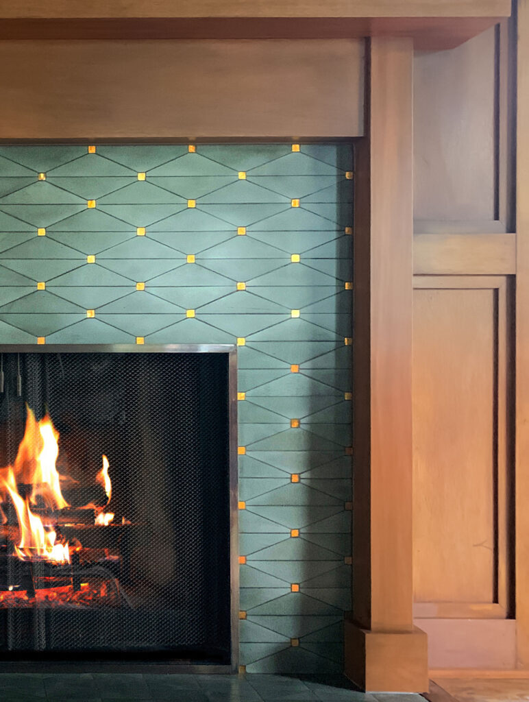 Mosaic fireplace with moss green cranbrook design
