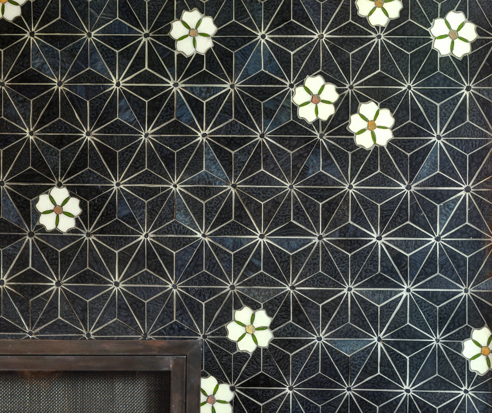 Mosaic fireplace with indigo sashiko design