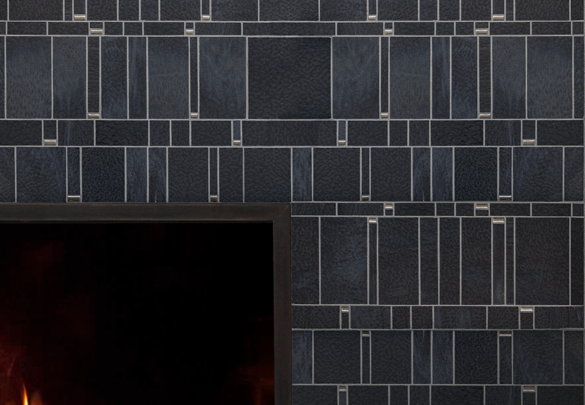 Mosaic fireplace with indigo ascent design