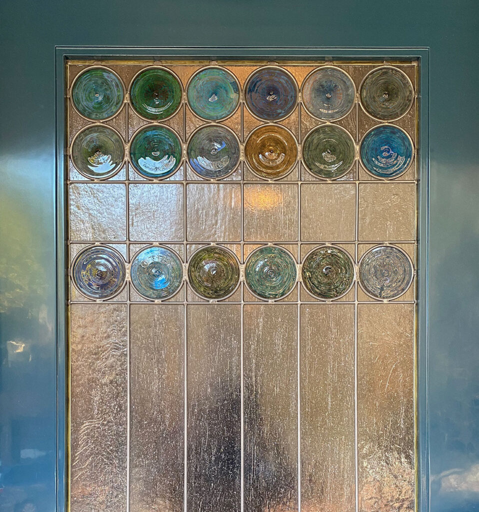 Rondel align stained glass window in door